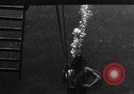 Image of a Navy diver training United States USA, 1943, second 26 stock footage video 65675049207