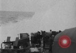 Standbild Amphibious Cargo Schiff Pacific Theater, 1943, aus Sekunde 58 historischem Filmmaterial Videoclip 65675049214