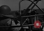 Image of Sailor mans twin 50 caliber machine gun in U.S. PT boat Atlantic Ocean, 1944, second 3 stock footage video 65675049225