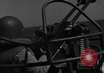 Image of Sailor mans twin 50 caliber machine gun in U.S. PT boat Atlantic Ocean, 1944, second 4 stock footage video 65675049225