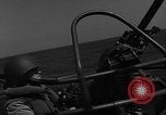 Image of Sailor mans twin 50 caliber machine gun in U.S. PT boat Atlantic Ocean, 1944, second 7 stock footage video 65675049225