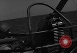 Image of Sailor mans twin 50 caliber machine gun in U.S. PT boat Atlantic Ocean, 1944, second 9 stock footage video 65675049225