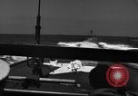 Image of Sailor mans twin 50 caliber machine gun in U.S. PT boat Atlantic Ocean, 1944, second 14 stock footage video 65675049225