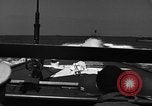 Image of Sailor mans twin 50 caliber machine gun in U.S. PT boat Atlantic Ocean, 1944, second 15 stock footage video 65675049225