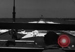 Image of Sailor mans twin 50 caliber machine gun in U.S. PT boat Atlantic Ocean, 1944, second 17 stock footage video 65675049225