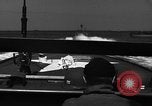 Image of Sailor mans twin 50 caliber machine gun in U.S. PT boat Atlantic Ocean, 1944, second 18 stock footage video 65675049225