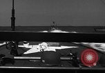 Image of Sailor mans twin 50 caliber machine gun in U.S. PT boat Atlantic Ocean, 1944, second 20 stock footage video 65675049225
