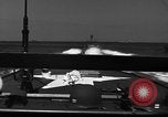 Image of Sailor mans twin 50 caliber machine gun in U.S. PT boat Atlantic Ocean, 1944, second 21 stock footage video 65675049225