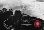 Image of Sailor mans twin 50 caliber machine gun in U.S. PT boat Atlantic Ocean, 1944, second 23 stock footage video 65675049225