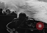 Image of Sailor mans twin 50 caliber machine gun in U.S. PT boat Atlantic Ocean, 1944, second 26 stock footage video 65675049225