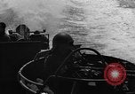 Image of Sailor mans twin 50 caliber machine gun in U.S. PT boat Atlantic Ocean, 1944, second 28 stock footage video 65675049225