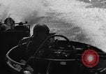 Image of Sailor mans twin 50 caliber machine gun in U.S. PT boat Atlantic Ocean, 1944, second 29 stock footage video 65675049225
