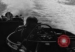 Image of Sailor mans twin 50 caliber machine gun in U.S. PT boat Atlantic Ocean, 1944, second 30 stock footage video 65675049225