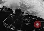 Image of Sailor mans twin 50 caliber machine gun in U.S. PT boat Atlantic Ocean, 1944, second 31 stock footage video 65675049225