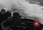 Image of Sailor mans twin 50 caliber machine gun in U.S. PT boat Atlantic Ocean, 1944, second 32 stock footage video 65675049225