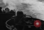 Image of Sailor mans twin 50 caliber machine gun in U.S. PT boat Atlantic Ocean, 1944, second 33 stock footage video 65675049225
