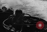 Image of Sailor mans twin 50 caliber machine gun in U.S. PT boat Atlantic Ocean, 1944, second 34 stock footage video 65675049225