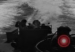 Image of Sailor mans twin 50 caliber machine gun in U.S. PT boat Atlantic Ocean, 1944, second 38 stock footage video 65675049225
