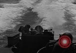 Image of Sailor mans twin 50 caliber machine gun in U.S. PT boat Atlantic Ocean, 1944, second 41 stock footage video 65675049225