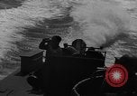 Image of Sailor mans twin 50 caliber machine gun in U.S. PT boat Atlantic Ocean, 1944, second 44 stock footage video 65675049225