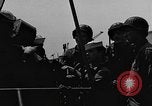 Image of U.S. soldiers ask Coast Guardsmen about 20mm antiaircraft gun Weymouth England United Kingdom, 1944, second 8 stock footage video 65675049228