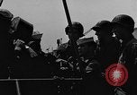 Image of U.S. soldiers ask Coast Guardsmen about 20mm antiaircraft gun Weymouth England United Kingdom, 1944, second 9 stock footage video 65675049228