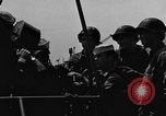 Image of U.S. soldiers ask Coast Guardsmen about 20mm antiaircraft gun Weymouth England United Kingdom, 1944, second 10 stock footage video 65675049228