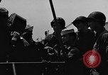 Image of U.S. soldiers ask Coast Guardsmen about 20mm antiaircraft gun Weymouth England United Kingdom, 1944, second 11 stock footage video 65675049228