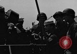 Image of U.S. soldiers ask Coast Guardsmen about 20mm antiaircraft gun Weymouth England United Kingdom, 1944, second 13 stock footage video 65675049228