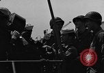 Image of U.S. soldiers ask Coast Guardsmen about 20mm antiaircraft gun Weymouth England United Kingdom, 1944, second 17 stock footage video 65675049228