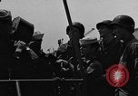 Image of U.S. soldiers ask Coast Guardsmen about 20mm antiaircraft gun Weymouth England United Kingdom, 1944, second 18 stock footage video 65675049228