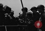 Image of U.S. soldiers ask Coast Guardsmen about 20mm antiaircraft gun Weymouth England United Kingdom, 1944, second 22 stock footage video 65675049228