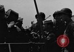 Image of U.S. soldiers ask Coast Guardsmen about 20mm antiaircraft gun Weymouth England United Kingdom, 1944, second 23 stock footage video 65675049228