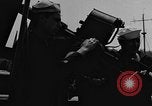 Image of U.S. soldiers ask Coast Guardsmen about 20mm antiaircraft gun Weymouth England United Kingdom, 1944, second 24 stock footage video 65675049228