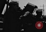 Image of U.S. soldiers ask Coast Guardsmen about 20mm antiaircraft gun Weymouth England United Kingdom, 1944, second 25 stock footage video 65675049228