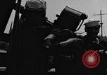 Image of U.S. soldiers ask Coast Guardsmen about 20mm antiaircraft gun Weymouth England United Kingdom, 1944, second 29 stock footage video 65675049228