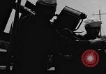 Image of U.S. soldiers ask Coast Guardsmen about 20mm antiaircraft gun Weymouth England United Kingdom, 1944, second 34 stock footage video 65675049228