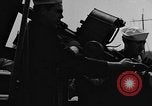 Image of U.S. soldiers ask Coast Guardsmen about 20mm antiaircraft gun Weymouth England United Kingdom, 1944, second 36 stock footage video 65675049228