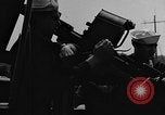Image of U.S. soldiers ask Coast Guardsmen about 20mm antiaircraft gun Weymouth England United Kingdom, 1944, second 37 stock footage video 65675049228