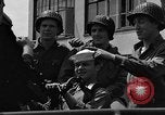 Image of U.S. soldiers ask Coast Guardsmen about 20mm antiaircraft gun Weymouth England United Kingdom, 1944, second 41 stock footage video 65675049228