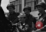 Image of U.S. soldiers ask Coast Guardsmen about 20mm antiaircraft gun Weymouth England United Kingdom, 1944, second 42 stock footage video 65675049228