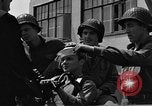Image of U.S. soldiers ask Coast Guardsmen about 20mm antiaircraft gun Weymouth England United Kingdom, 1944, second 45 stock footage video 65675049228