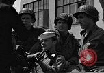 Image of U.S. soldiers ask Coast Guardsmen about 20mm antiaircraft gun Weymouth England United Kingdom, 1944, second 48 stock footage video 65675049228
