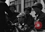 Image of U.S. soldiers ask Coast Guardsmen about 20mm antiaircraft gun Weymouth England United Kingdom, 1944, second 49 stock footage video 65675049228