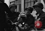 Image of U.S. soldiers ask Coast Guardsmen about 20mm antiaircraft gun Weymouth England United Kingdom, 1944, second 50 stock footage video 65675049228