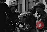 Image of U.S. soldiers ask Coast Guardsmen about 20mm antiaircraft gun Weymouth England United Kingdom, 1944, second 51 stock footage video 65675049228
