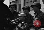 Image of U.S. soldiers ask Coast Guardsmen about 20mm antiaircraft gun Weymouth England United Kingdom, 1944, second 55 stock footage video 65675049228