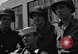 Image of U.S. soldiers ask Coast Guardsmen about 20mm antiaircraft gun Weymouth England United Kingdom, 1944, second 58 stock footage video 65675049228