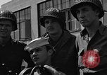 Image of U.S. soldiers ask Coast Guardsmen about 20mm antiaircraft gun Weymouth England United Kingdom, 1944, second 60 stock footage video 65675049228