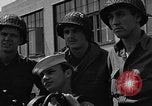 Image of U.S. soldiers ask Coast Guardsmen about 20mm antiaircraft gun Weymouth England United Kingdom, 1944, second 61 stock footage video 65675049228